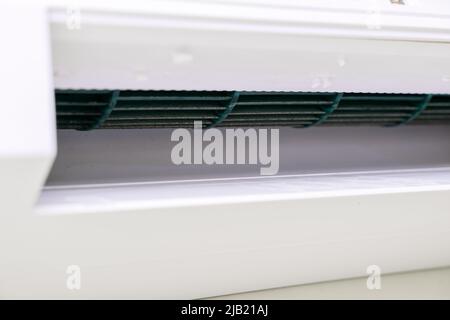 dirty ceiling air conditioner cooler closeup. Stock Photo