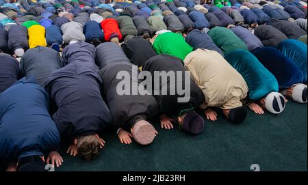 Muslim men praying. A Muslim Friday mass prayer.  Stock Photo