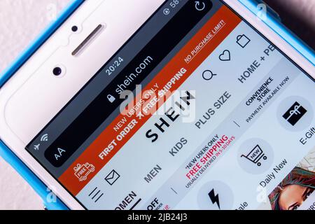 Kumamoto, JAPAN - Mar 14 2022 : The website of Shein, a Chinese fast fashion online fast fashion retailer, on an iPhone screen. Stock Photo