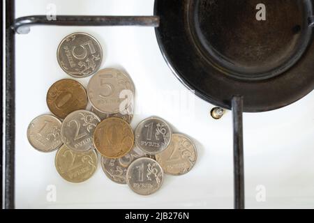 Russian rubles on a gas burner in the kitchen, gas sanctions, gas and the economy Stock Photo