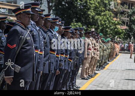 Kenyan police officers are seen in their ceremonial uniforms at a parade during the commemoration of 59th Madaraka Day Celebrations held at Railways Grounds in Nakuru City. Kenya attained self-rule on June 1st, 1963 from the hands of the British colonial government. (Photo by James Wakibia / SOPA Images/Sipa USA) Stock Photo