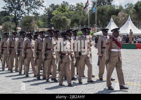 Kenyan police officers are seen in their ceremonial uniforms at a parade during the commemoration of 59th Madaraka Day Celebrations held at Railways Grounds in Nakuru City. Kenya attained self-rule on June 1st, 1963 from the hands of the British colonial government. (Photo by James Wakibia / SOPA Images/Sipa USA) Stock Photo