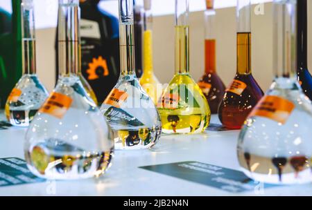 Kazan, Russia. May 19, 2022. Refinery products. Machine oils. Gasoline and diesel fuel. Various gases. Samples of chemical products in glass flasks. Products of TATNEFT Company Stock Photo