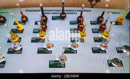 Kazan, Russia. May 19, 2022. Refinery products. Machine oils. Gasoline and diesel fuel. Various gases. Samples of chemical products in glass flasks. Products of TATNEFT Company Stock Photo