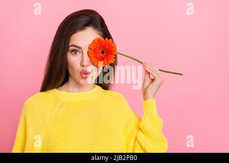 Photo of young pretty girl cover eye flower pouted lips cosmetology procedure isolated over pink color background Stock Photo