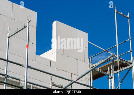 Shell of a multi-family house with scaffolding in Bad Homburg (Vickers - Areal) near Frankfurt am Main Stock Photo