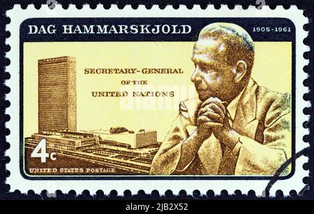 USA - CIRCA 1962: A stamp printed in USA shows Dag Hammarskjold and U.N. Headquarters, circa 1962. Stock Photo