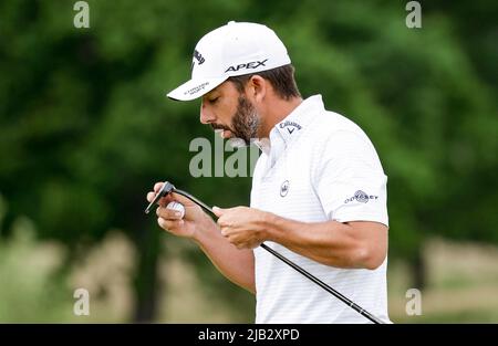 02 June 2022, Lower Saxony, Winsen (Luhe): Golf: European Tour, Singles, Men, 1st Round. Pablo Larrazabal from Spain checks his club. Photo: Axel Heimken/dpa Stock Photo