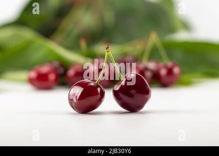 Sweet cherry berries isolated on white background. Selective focus. Stock Photo