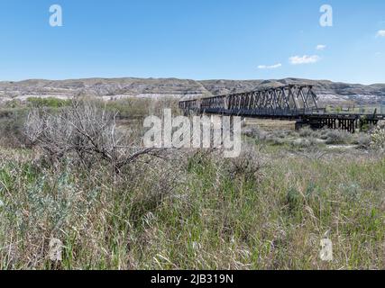 Historic Howe truss train bridge crossing the Red Deer River near Drumheller Stock Photo