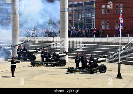 Reservists from 104 Regiment Royal Artillery perform the 42 gun salute for the Queen's Platinum Jubilee at Roald Dahl Plass, Cardiff Bay, Wales Stock Photo