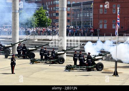 Reservists from 104 Regiment Royal Artillery perform the 42 gun salute for the Queen's Platinum Jubilee at Roald Dahl Plass, Cardiff Bay, Wales Stock Photo