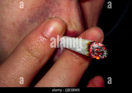 A person smoking a cigarette. Rennes city. Illustrations of the city of Rennes. France. Stock Photo