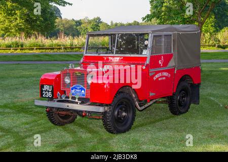 1949 40s forties Red Series II Land Rover SWB canvas top pick-up, arriving in Worden Park Motor Village for the Leyland Festival, UK Stock Photo