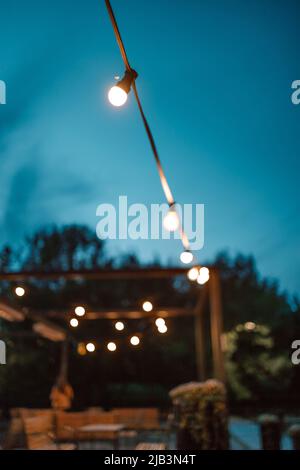 Closed up romantic light bulb blurred for restaurant and cafe night  background Stock Photo - Alamy
