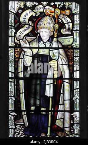 A stained glass window by C E Kempe & Co. depicting St Augustine, All Saints Church, Leighton Buzzard, Bedfordshire Stock Photo