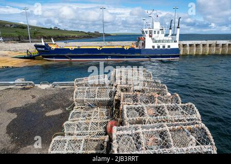 The Eynehallow ferry arrives at Brinian on the Island of Rousay, Orkney Islands, Scotland.