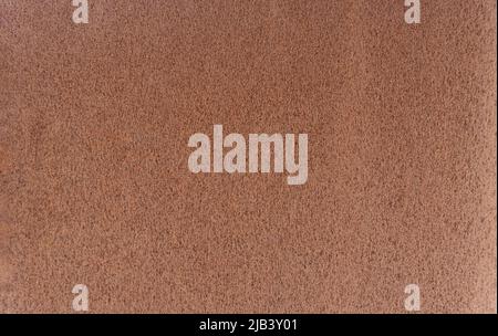 Background, structure of rusty sheet metal. Texture with a porous structure of rusty metal. Stock Photo