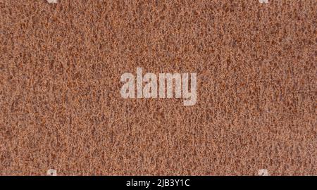 Background, structure of rusty sheet metal. Texture with a porous structure of rusty metal. Stock Photo