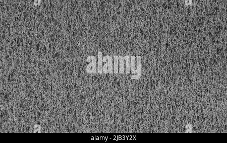 Background, structure of rusty sheet metal. Texture with a porous structure of rusty metal. Stock Photo