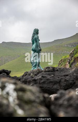 Statue of Kopakonan, legendary Selkie sealwoman, Mikladalur village