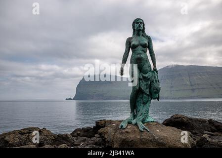 Statue of Kopakonan, legendary Selkie sealwoman, Mikladalur village ...