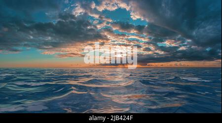 Ominous storm clouds over rough water Stock Photo