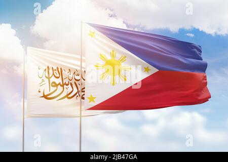 Sunny blue sky and flags of philippines and afghanistan Stock Photo