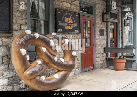 Lititz, PA, USA - May 2, 2022: A large pretzel sign at the Julius Sturgis Pretzel Bakery, the first commercial pretzel bakery in America Stock Photo