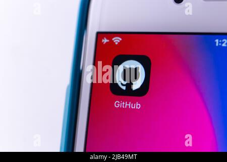 The app of GitHub, a provider of Internet hosting for software development and version control using Git (subsidiary of Microsoft), on iPhone. Stock Photo