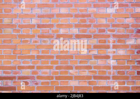 Plain old brick wall image. The wall in image is faded and sooty. Stock Photo