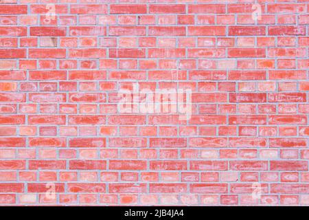 Plain old brick wall image. The wall in image is faded and sooty. Stock Photo