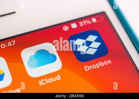 Kumamoto, Japan, Mar 30, 2020 : Icons of cloud storages on iPhone. OneDrive, Google Drive, iCloud and Dropbox are the top four file-sharing services Stock Photo