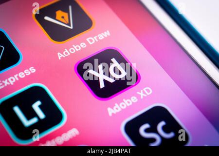 Kumamoto, Japan - Apr 17 2020: Adobe XD, a vector-based UX design tool for web apps and mobile apps by Adobe, with other Adobe apps on iPhone Stock Photo