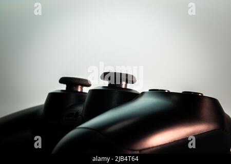 Joysticks of DualShock 4 controller. PlayStation 4 (PS4) is an 8th-gen home video game console developed by Sony Computer Entertainment. Stock Photo