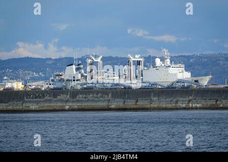 French Navy ship in front of the former Brest submarine repair yard, bunkers built in WW2, now used by the French Navy, Brest, Finistere Penn ar Bed Stock Photo