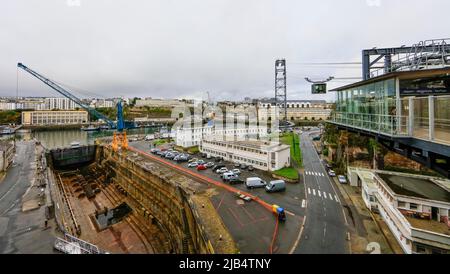 French Navy shipyard site with dry dock on the river Penfeld in the centre of Brest shortly in front of the confluence with the Bay of Brest, on the Stock Photo