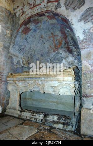 Broken open historical marble sarcophagus of Saint Nicholas in former Byzantine church, St. Nicholas Church, Myra, Demre, Turkey Stock Photo