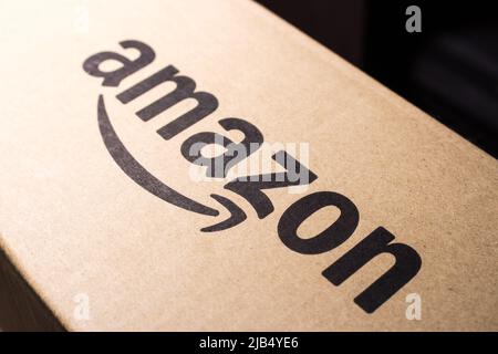 Kumamoto, Japan - Mar 5 2020 : Amazon logo printed on cardboard box. Amazon.com, Inc. is an US technology company based in Seattle, Washington Stock Photo