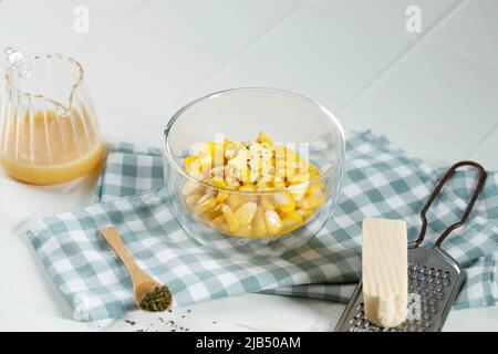 Steamed Fresh Corn with Butter on Transparan Bowl, Usually Served with Shredded Cheese, Dry Herbs, and Condensed Milk. In Indonesia Popular as Jasuke Stock Photo
