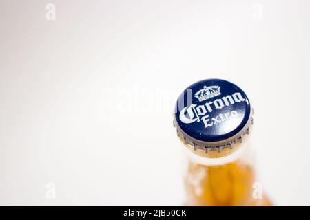 Bottle top of Corona Extra. Corona Extra is one of the top-selling beers worldwide and pale lager produced by Cervecería Modelo in Mexico Stock Photo