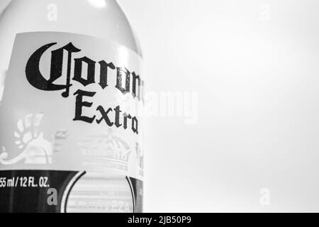 Kumamoto, Japan - May 7 2020: Corona Extra in monochrome colour, one of the top-selling beers worldwide, on white background. Corona Extra is a pale l Stock Photo