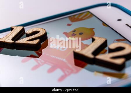 Kumamoto, JAPAN - Dec 10 2020 : Taobao logo with wooden numbers “double 12” on iPhone. Double twelve (W12) is the Chinese version of Black Friday Stock Photo
