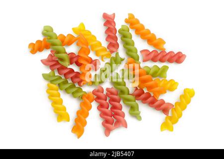 raw Fusilli colored pasta, isolated on white background with full depth of field. Top view. Flat lay Stock Photo