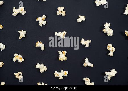 Popcorn on an black background, close-up view from above Stock Photo