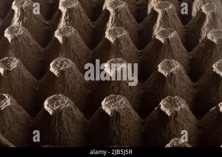 Abstract background. frame geometry. Egg packaging. Paper tray for domestic eggs. Beige and grey. Minimalism. Paper packaging egg carton Stock Photo
