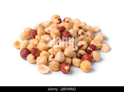 Peeled hazelnuts are isolated on a white background. Stock Photo