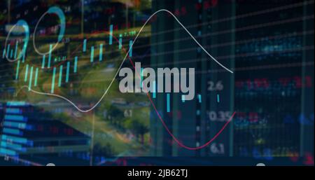 Image of financial data and graphs over cityscape Stock Photo