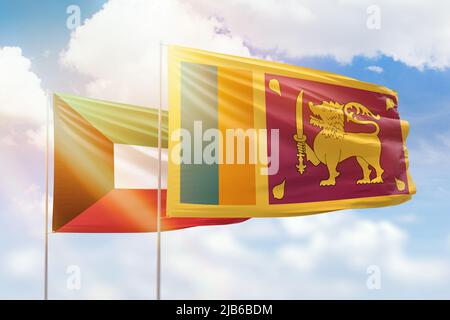 Kuwait and Sri Lanka flags waving together in the wind on blue cloudy ...