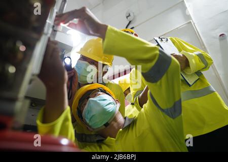 (220603) -- VIENTIANE, June 3, 2022 (Xinhua) -- Workers of Luang Prabang Operation Management Center under the Laos-China Railway Co., Ltd. (LCRC) conduct maintenance work of devices in Luang Prabang Province, Laos, May 28, 2022. The China-Laos Railway, half a year into its operation, has delivered more than 4 million tonnes of freight as of Thursday, China's railway operator said.   As a landmark project under the Belt and Road Initiative, the 1,035-km railway connects China's Kunming with the Laotian capital Vientiane. (LCRC/Handout via Xinhua) Stock Photo